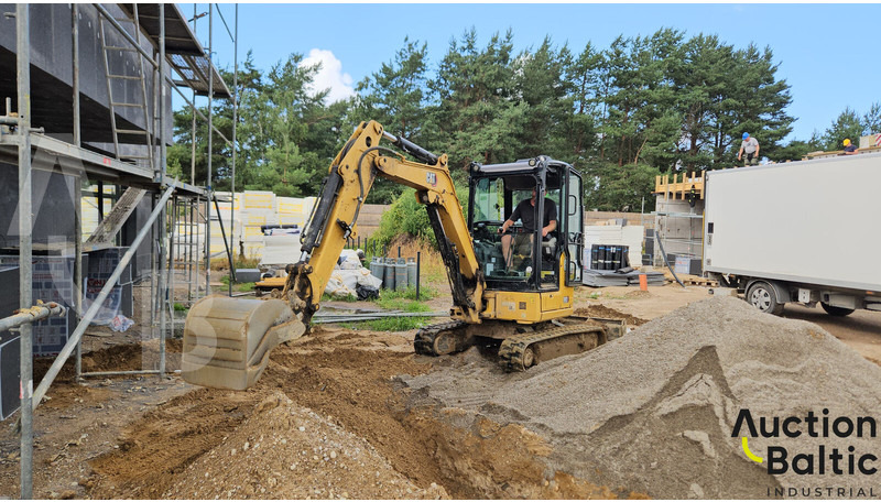 Caterpillar 303 CR - حفارة مصغرة: صور 1 Caterpillar 303 CR - حفارة مصغرة: صور 1