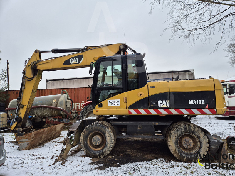 Caterpillar M 318 D - حفارة على عجلات: صور 1 Caterpillar M 318 D - حفارة على عجلات: صور 1