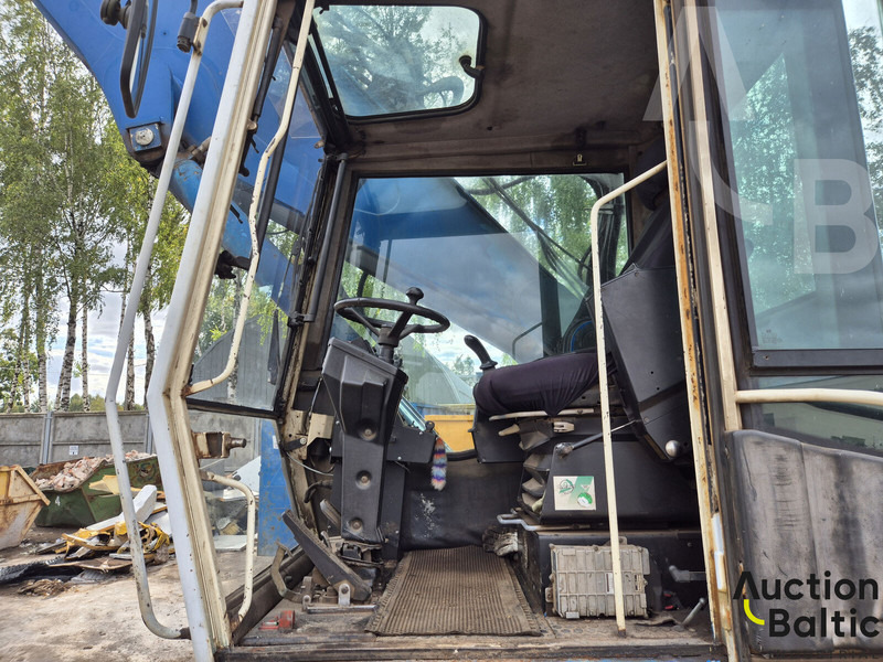 Fuchs MHL 350 - حفارة على عجلات: صور 5 Fuchs MHL 350 - حفارة على عجلات: صور 5