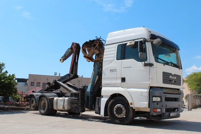 MAN TGA 26.360 FG 6x2 LL GERGEN Abroll + Penz Kran - شاحنة ذات الخطاف, شاحنة كرين: صور 1 MAN TGA 26.360 FG 6x2 LL GERGEN Abroll + Penz Kran - شاحنة ذات الخطاف, شاحنة كرين: صور 1
