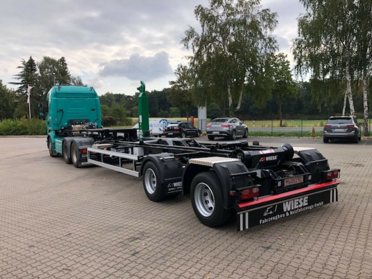 Auflieger Abrollkipper Hakenlift Hooklift - شاحنات الحاويات/ جسم علوي قابل للتغيير نصف مقطورة: صور 1 Auflieger Abrollkipper Hakenlift Hooklift - شاحنات الحاويات/ جسم علوي قابل للتغيير نصف مقطورة: صور 1