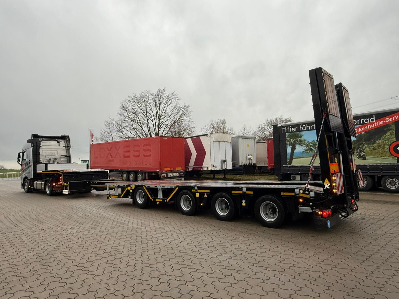 عربة مسطحة منخفضة نصف مقطورة Kässbohrer K.SLA R 4 / 2N 18/40 Tieflader Radmulden tele: صور 8 عربة مسطحة منخفضة نصف مقطورة Kässbohrer K.SLA R 4 / 2N 18/40 Tieflader Radmulden tele: صور 8