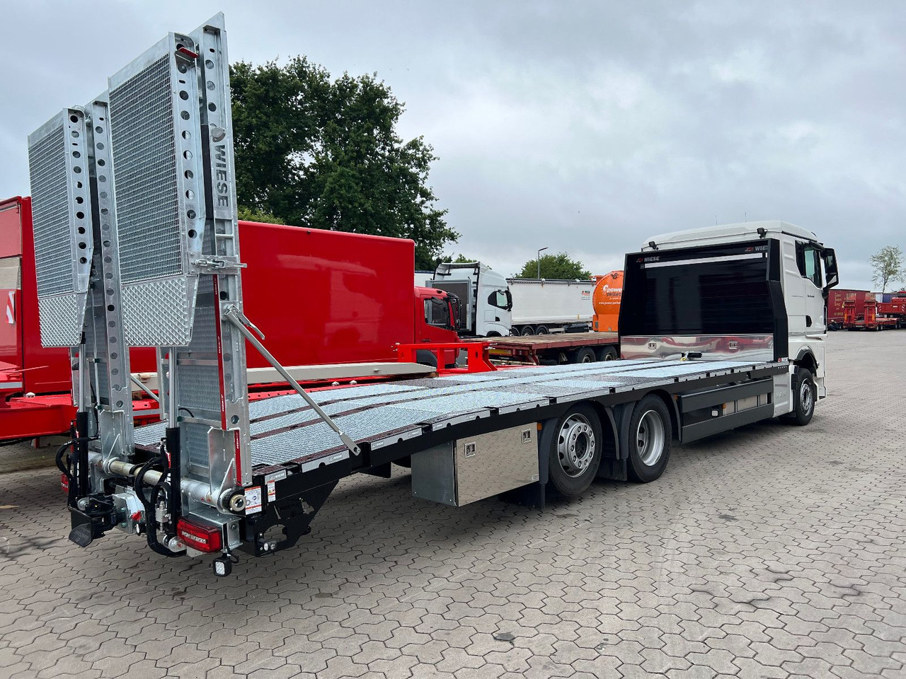 MAN Baumaschinen- Arbeitsbühnentransporter Rampen - سيارة السحب للتصليح: صور 5 MAN Baumaschinen- Arbeitsbühnentransporter Rampen - سيارة السحب للتصليح: صور 5
