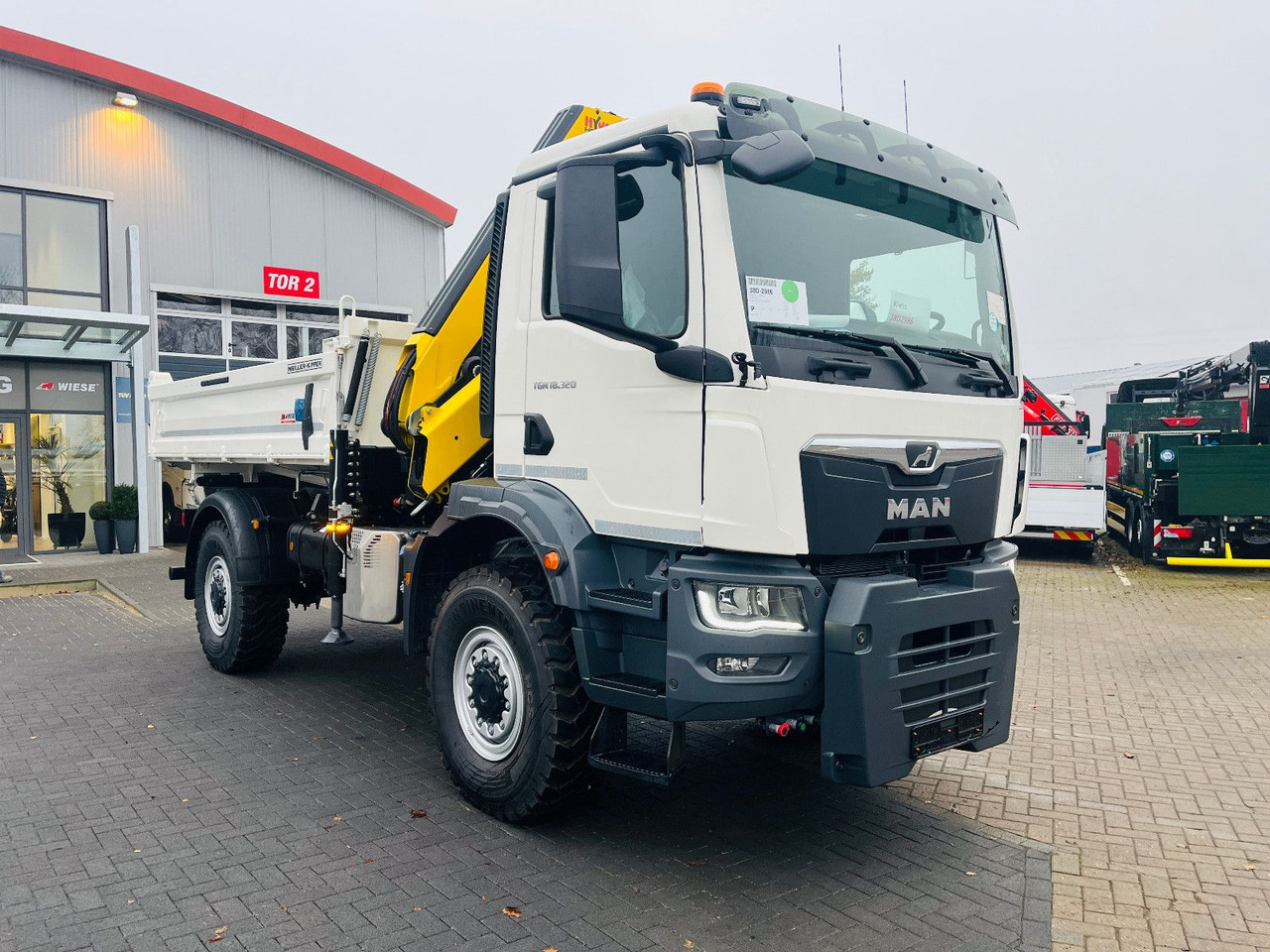 MAN TGM 18.320 4x4 BB Kipper Kran 131 Single Winter - قلابات, شاحنة كرين: صور 1 MAN TGM 18.320 4x4 BB Kipper Kran 131 Single Winter - قلابات, شاحنة كرين: صور 1