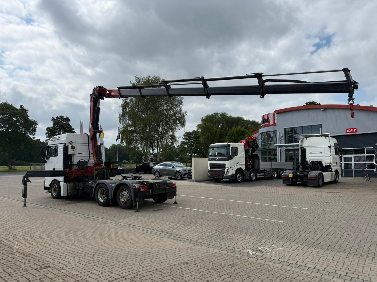 MAN TGX 26.440 6x2 mit HMF 3000-5 Kran TÜV NEU - شاحنة كرين: صور 3 MAN TGX 26.440 6x2 mit HMF 3000-5 Kran TÜV NEU - شاحنة كرين: صور 3