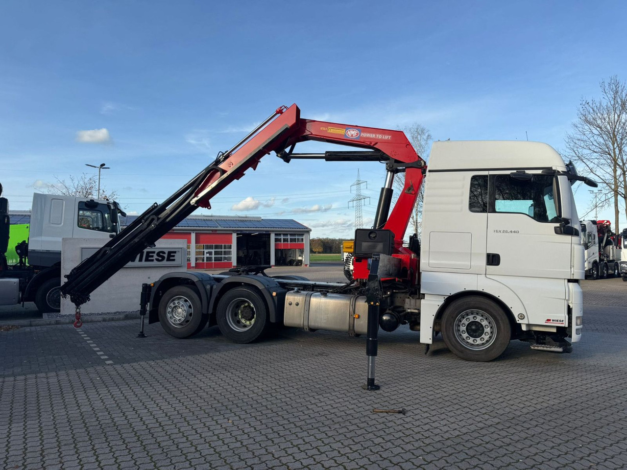 MAN TGX 26.440 6x2 mit HMF 3000-5 Kran Top Zustand - شاحنة كرين: صور 1 MAN TGX 26.440 6x2 mit HMF 3000-5 Kran Top Zustand - شاحنة كرين: صور 1