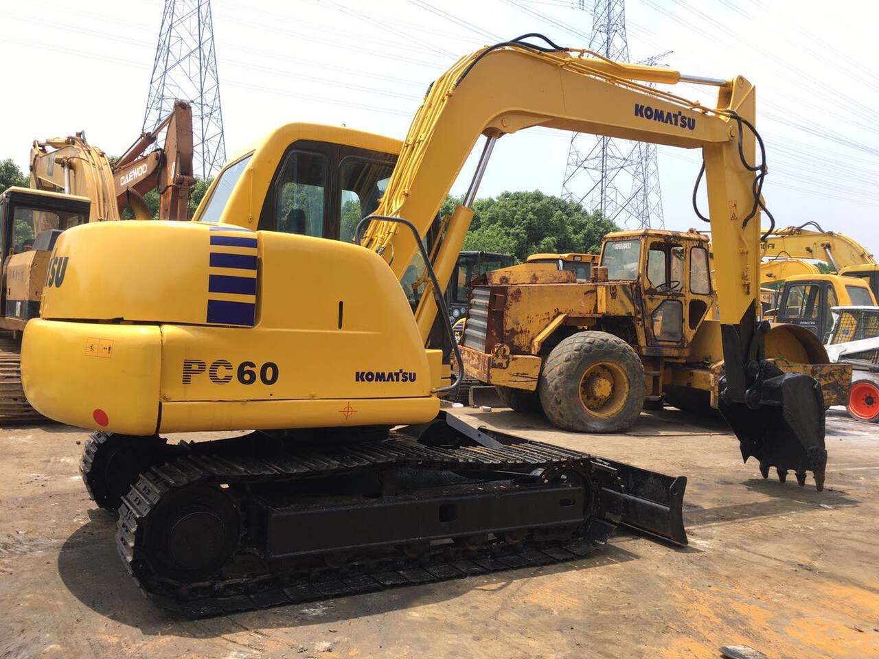 KOMATSU PC60-7 - حفارة مصغرة: صور 1 KOMATSU PC60-7 - حفارة مصغرة: صور 1