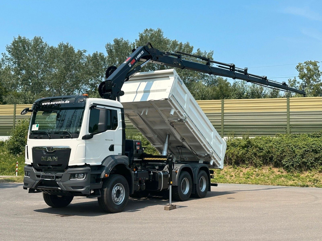 MAN TGS 33.440 6x4 /3-Seiten- Kipper / HIAB 228-6 - قلابات, شاحنة كرين: صور 1 MAN TGS 33.440 6x4 /3-Seiten- Kipper / HIAB 228-6 - قلابات, شاحنة كرين: صور 1