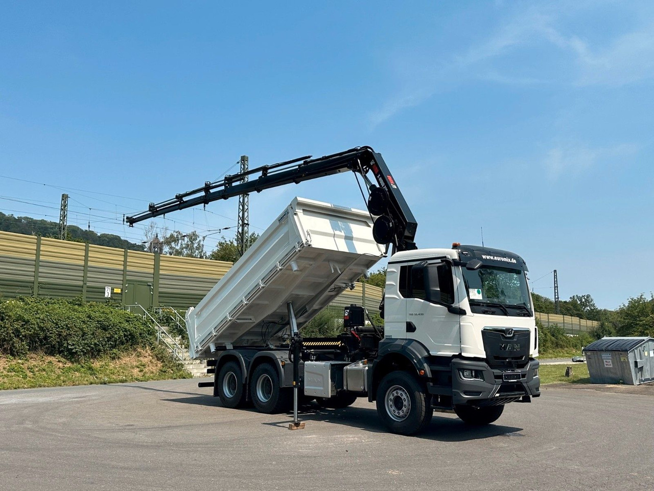 MAN TGS 33.440 6x4 /3-Seiten- Kipper / HIAB 228-6 - قلابات, شاحنة كرين: صور 1 MAN TGS 33.440 6x4 /3-Seiten- Kipper / HIAB 228-6 - قلابات, شاحنة كرين: صور 1