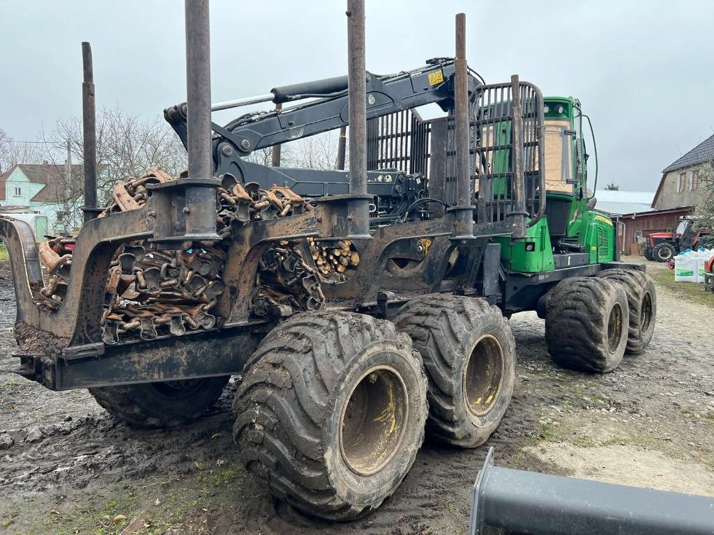 John Deere 1010 E - شاحنات نقل الأخشاب في الغابات: صور 5 John Deere 1010 E - شاحنات نقل الأخشاب في الغابات: صور 5
