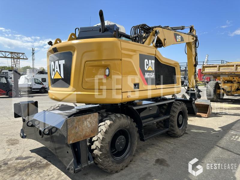 Caterpillar M315F - حفارة على عجلات: صور 3 Caterpillar M315F - حفارة على عجلات: صور 3