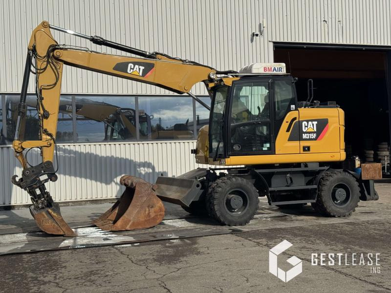 Caterpillar M315F - حفارة على عجلات: صور 1 Caterpillar M315F - حفارة على عجلات: صور 1