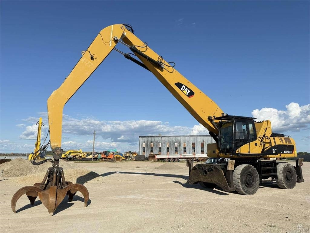 CAT M 325 DLMH - حفارة على عجلات: صور 1 CAT M 325 DLMH - حفارة على عجلات: صور 1