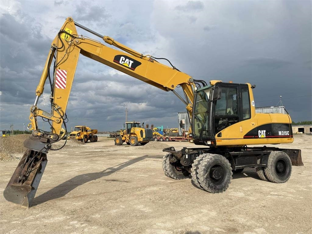 CAT M315C  - حفارة على عجلات: صور 3 CAT M315C  - حفارة على عجلات: صور 3