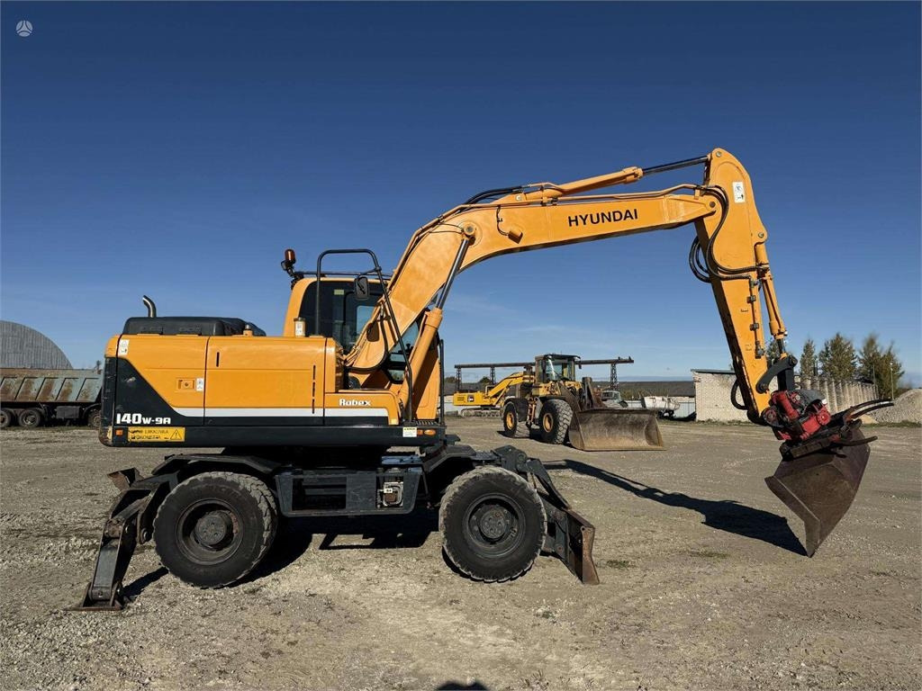 Hyundai Robex 140 W-9A Rototilt + grap - حفارة على عجلات: صور 5 Hyundai Robex 140 W-9A Rototilt + grap - حفارة على عجلات: صور 5