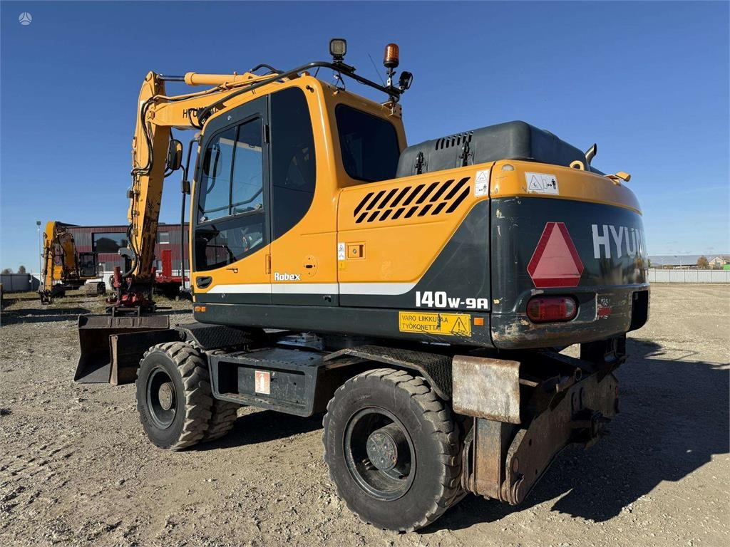 Hyundai Robex 140 W-9A Rototilt + grap - حفارة على عجلات: صور 3 Hyundai Robex 140 W-9A Rototilt + grap - حفارة على عجلات: صور 3