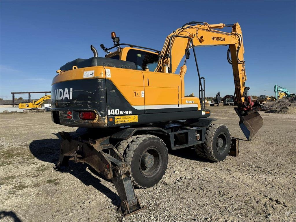 Hyundai Robex 140 W-9A Rototilt + grap - حفارة على عجلات: صور 4 Hyundai Robex 140 W-9A Rototilt + grap - حفارة على عجلات: صور 4