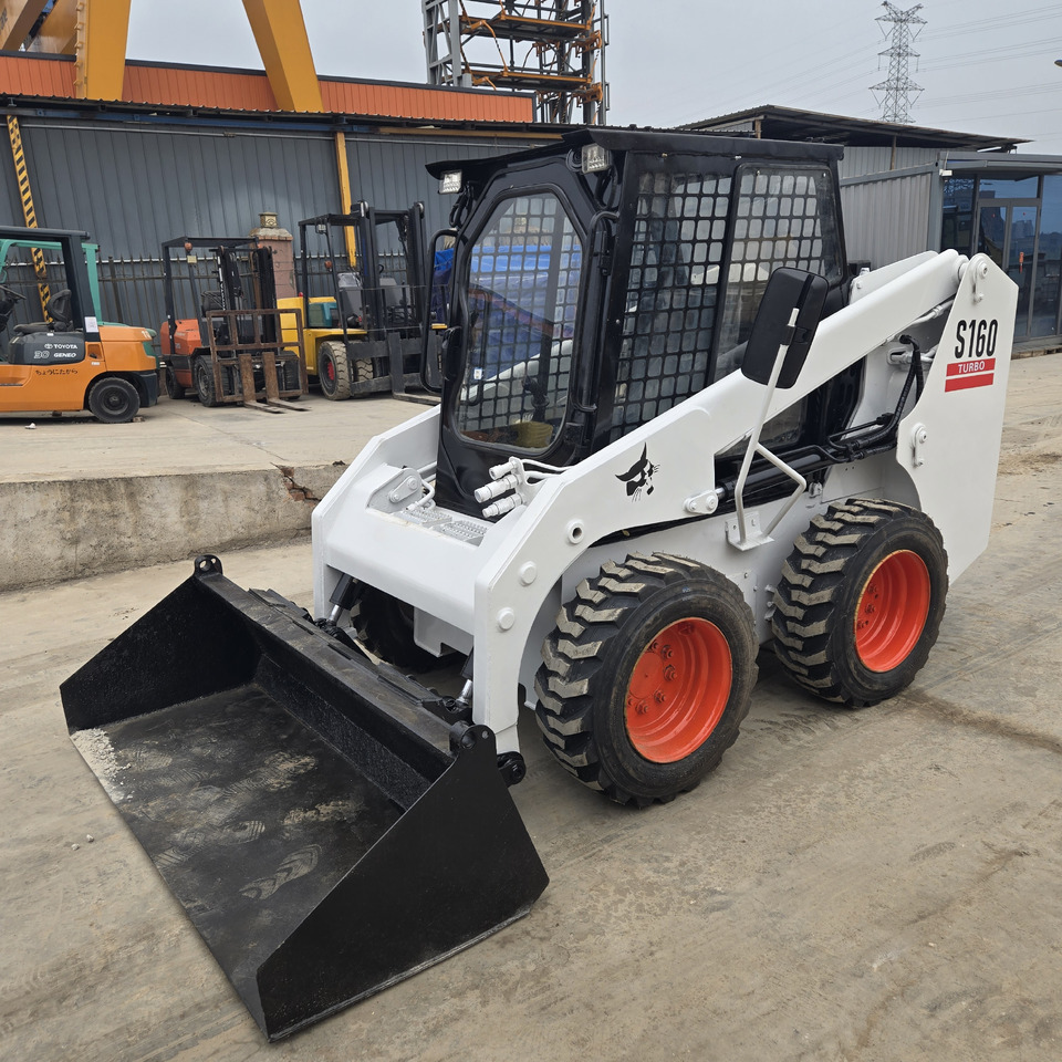 BOBCAT S160 - شيول صغير: صور 1 BOBCAT S160 - شيول صغير: صور 1