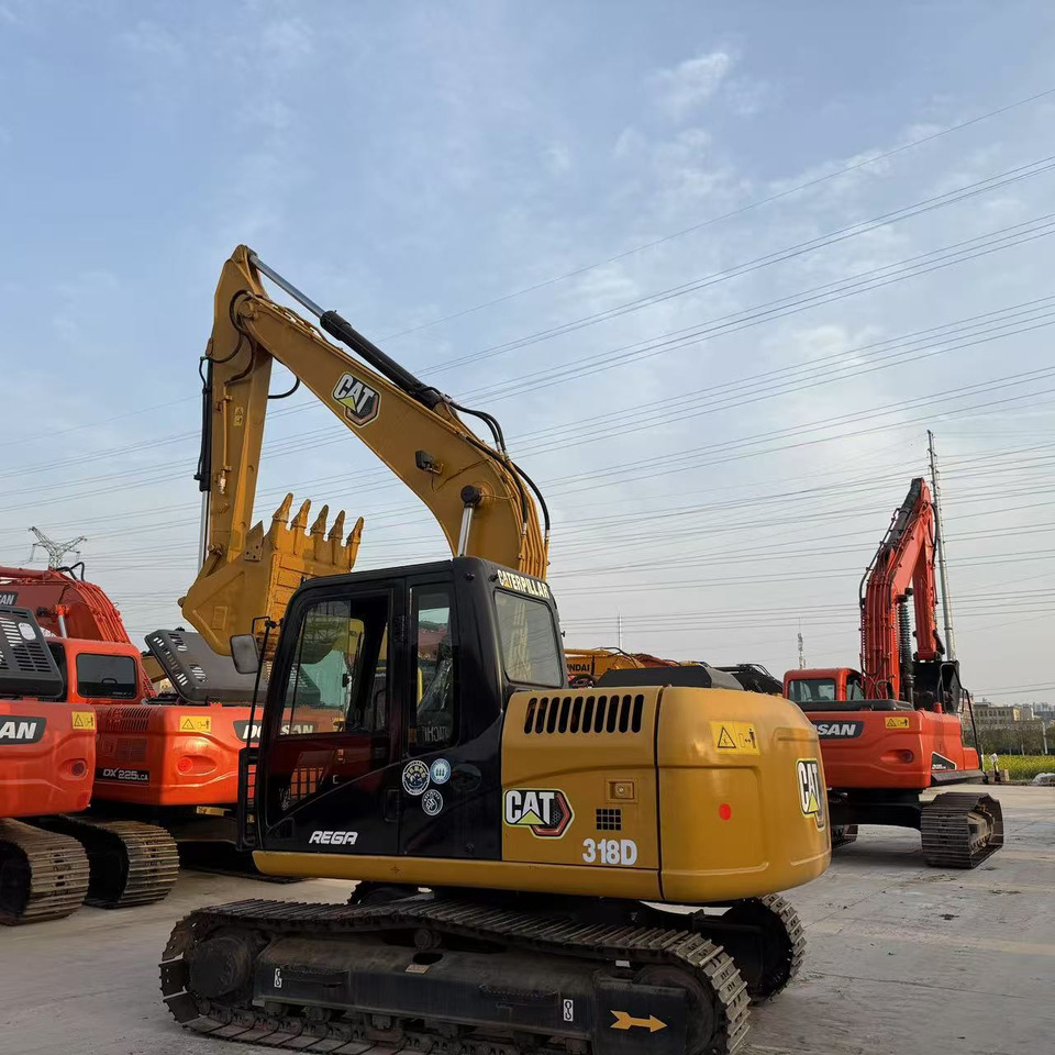 حفارات زحافة Caterpillar 318D: صور 7