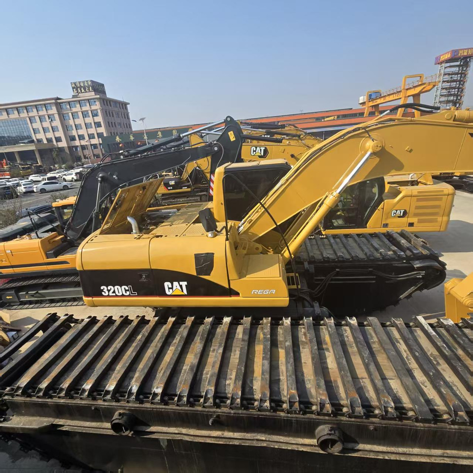 حفارات برمائية Caterpillar 320C: صور 6