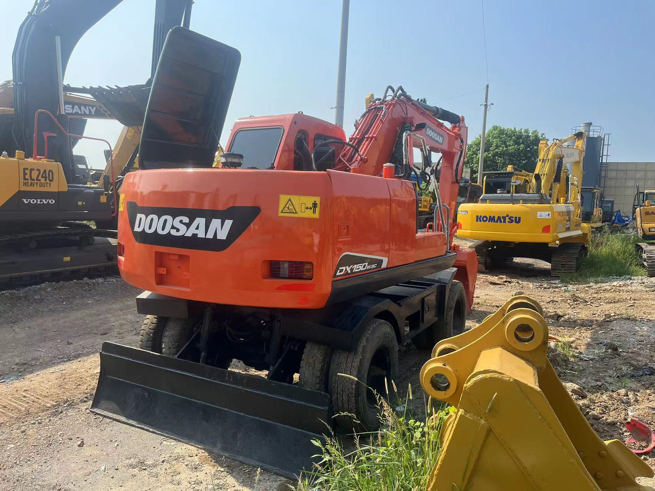 Doosan DX150W-9C - حفارة على عجلات: صور 2 Doosan DX150W-9C - حفارة على عجلات: صور 2