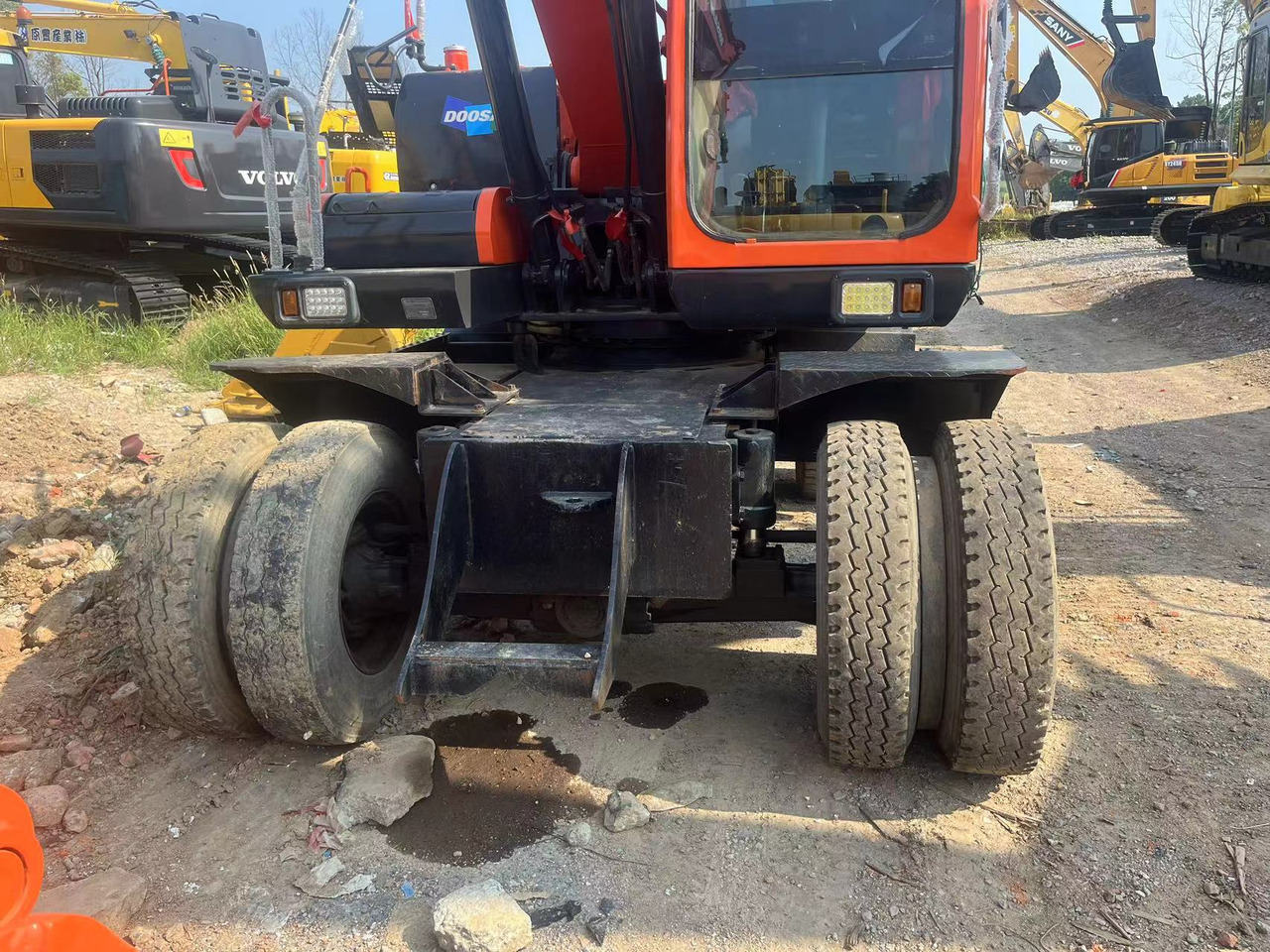 Doosan DX150W-9C - حفارة على عجلات: صور 3 Doosan DX150W-9C - حفارة على عجلات: صور 3