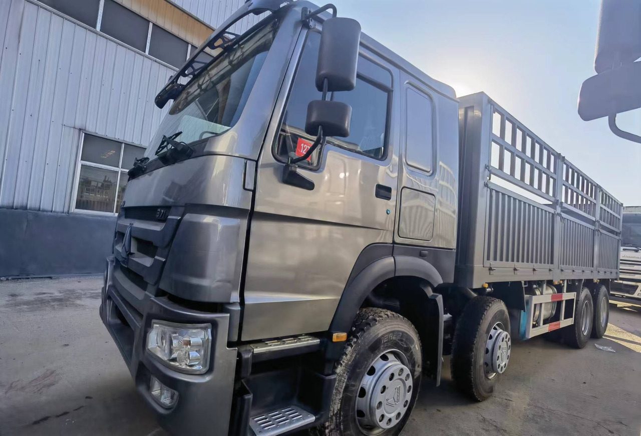 Sinotruk HOWO 371 8*4 Fence truck - شاحنات مسطحة: صور 1 Sinotruk HOWO 371 8*4 Fence truck - شاحنات مسطحة: صور 1