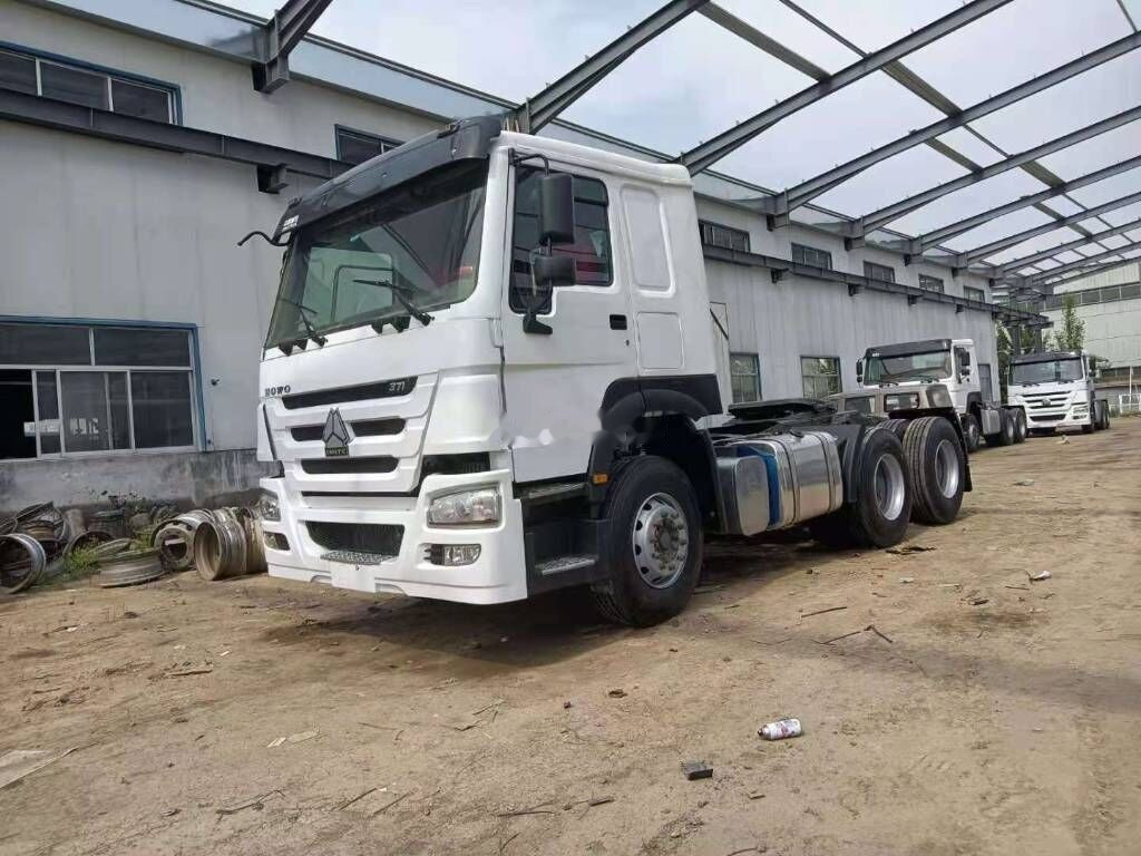 Sinotruk HOWO 6*4 Tractor - شاحنات الحاويات/ جسم علوي قابل للتغيير شاحنة: صور 1 Sinotruk HOWO 6*4 Tractor - شاحنات الحاويات/ جسم علوي قابل للتغيير شاحنة: صور 1
