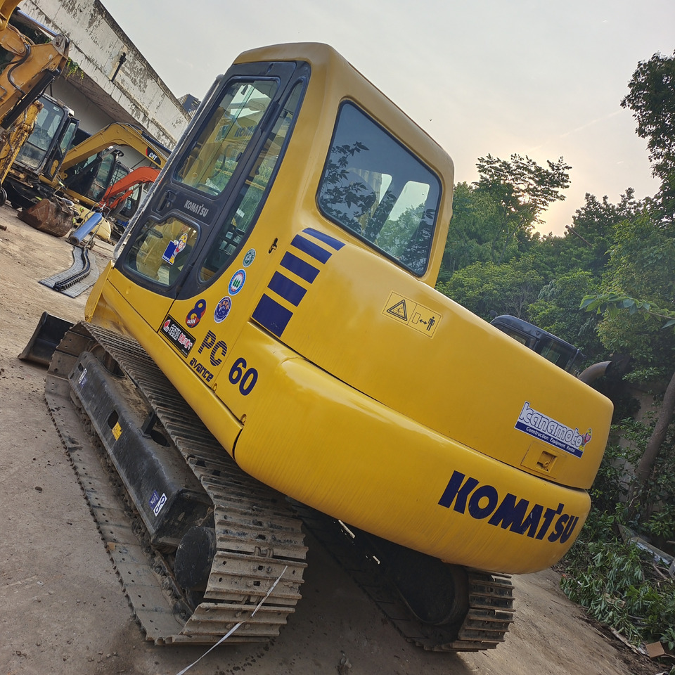KOMATSU PC 60 - حفارة مصغرة: صور 1 KOMATSU PC 60 - حفارة مصغرة: صور 1