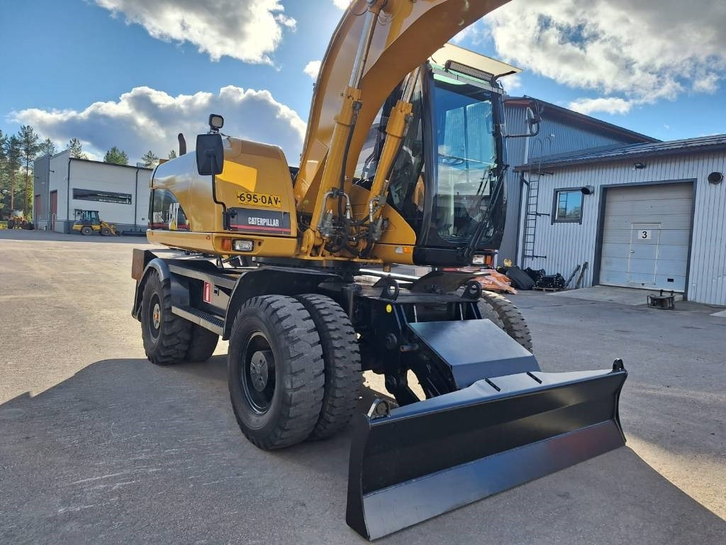 حفارة على عجلات CAT M316C: صور 6