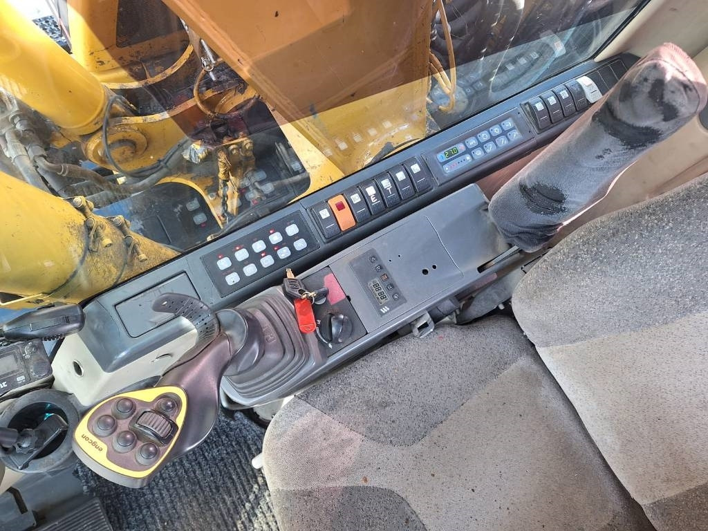 حفارة على عجلات CAT M316C: صور 14