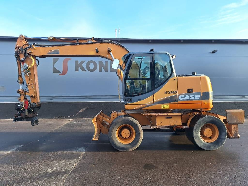 Case WX145 PYÖRITTÄJÄLLÄ  - حفارة على عجلات: صور 1 Case WX145 PYÖRITTÄJÄLLÄ  - حفارة على عجلات: صور 1