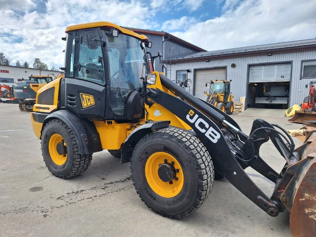 اللودر بعجل JCB 409 AURA, HIEKOITIN YM.: صور 6