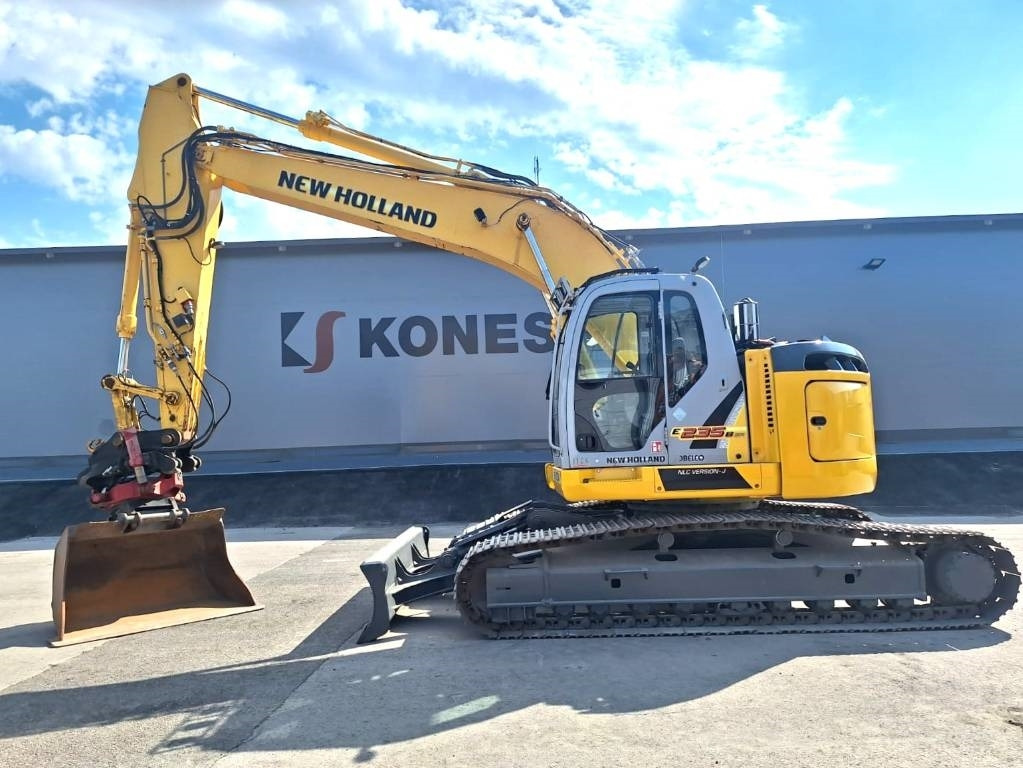 New Holland E235BSRLC PYÖRITTÄJÄLLÄ - حفارات زحافة: صور 1 New Holland E235BSRLC PYÖRITTÄJÄLLÄ - حفارات زحافة: صور 1