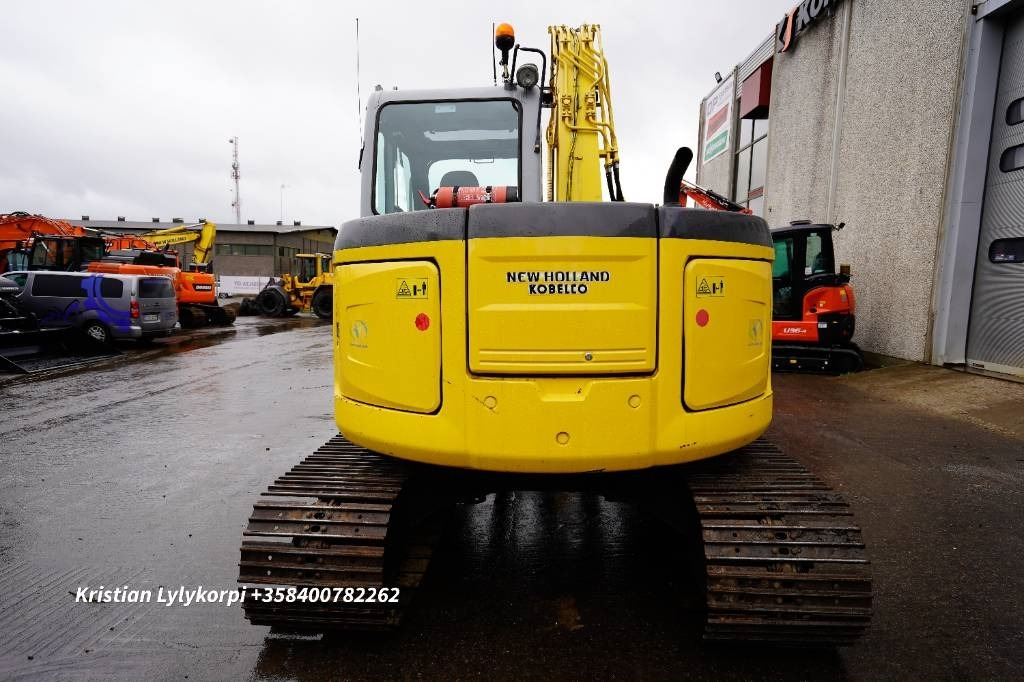 New Holland E70BSR ENGCON PIHDEILLÄ - حفارة مصغرة: صور 5 New Holland E70BSR ENGCON PIHDEILLÄ - حفارة مصغرة: صور 5