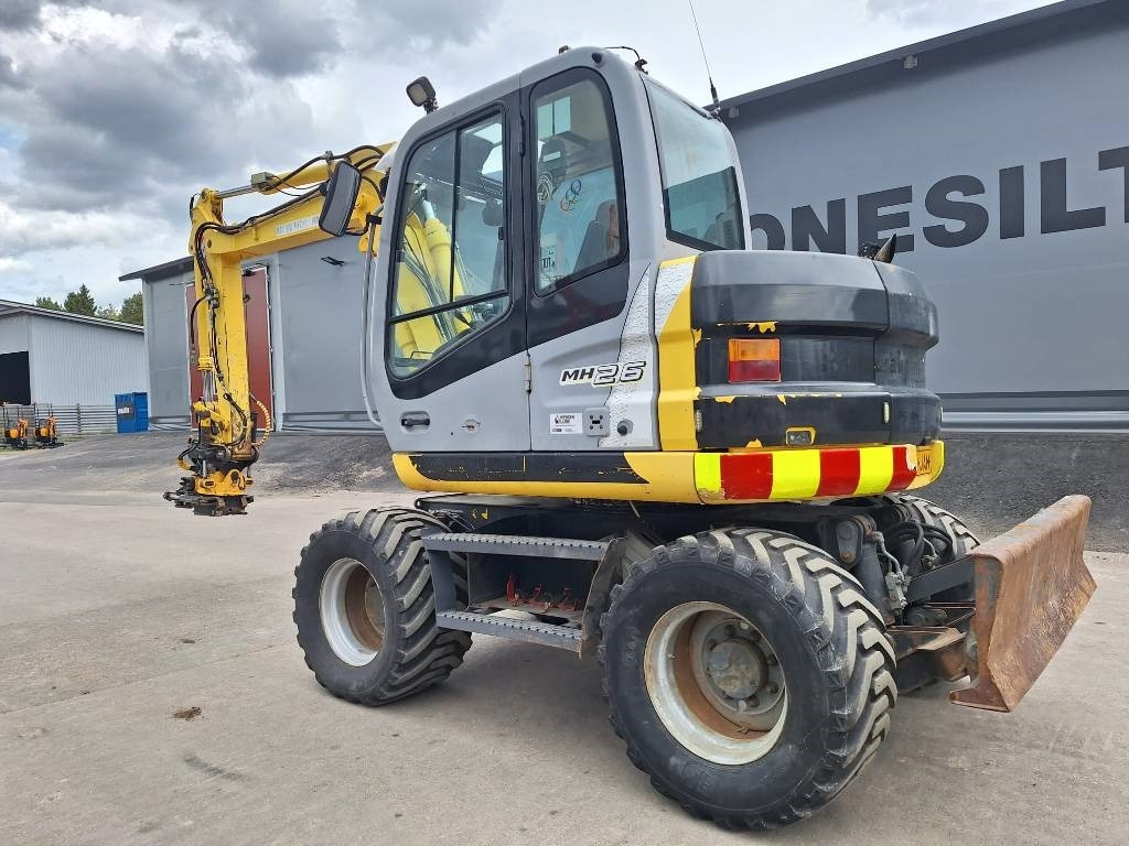New Holland MH2.6 ENGCON PIHDEILLÄ - حفارة على عجلات: صور 2 New Holland MH2.6 ENGCON PIHDEILLÄ - حفارة على عجلات: صور 2