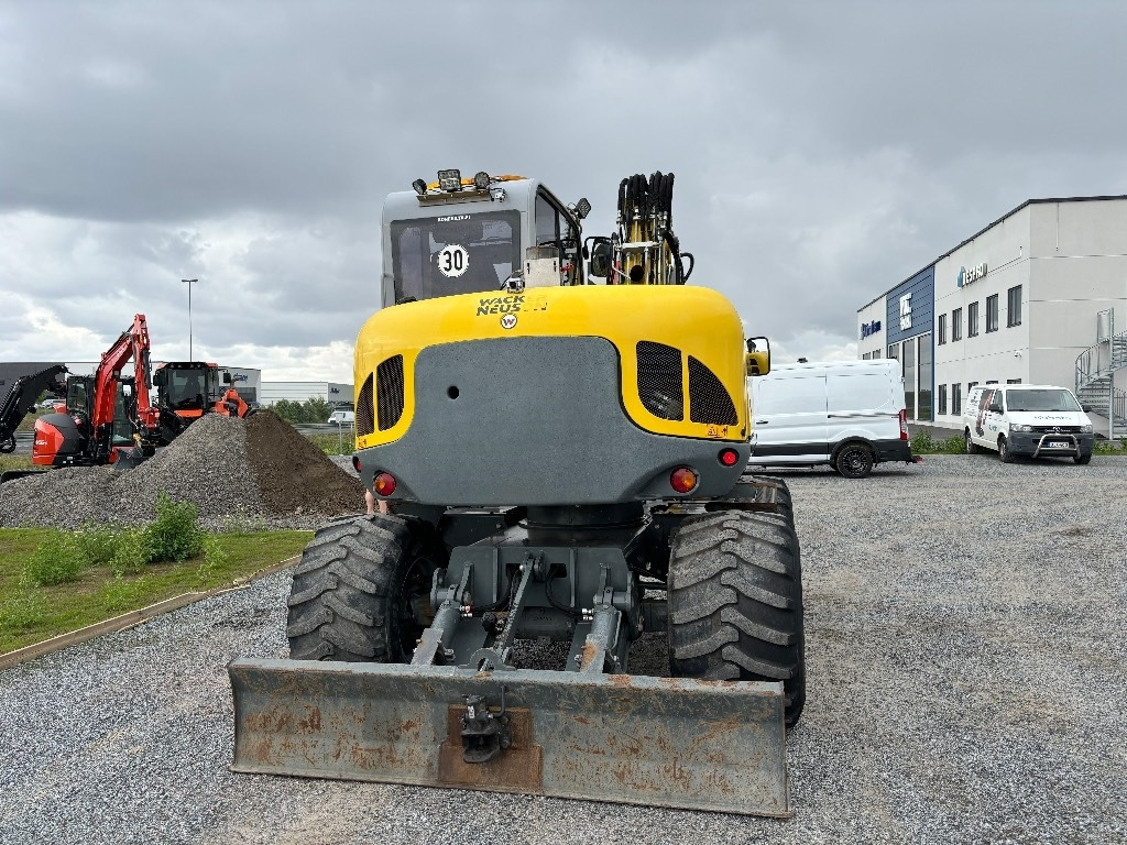 Wacker Neuson EW 100 - حفارة على عجلات: صور 3 Wacker Neuson EW 100 - حفارة على عجلات: صور 3