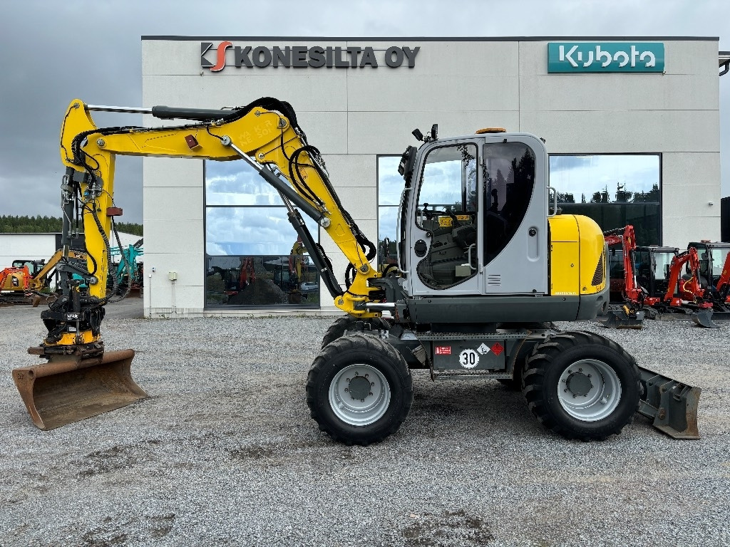 Wacker Neuson EW 100 - حفارة على عجلات: صور 1 Wacker Neuson EW 100 - حفارة على عجلات: صور 1