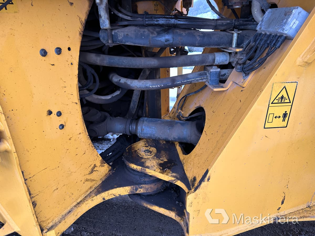 اللودر بعجل Hjullastare Volvo L180H: صور 38 اللودر بعجل Hjullastare Volvo L180H: صور 38