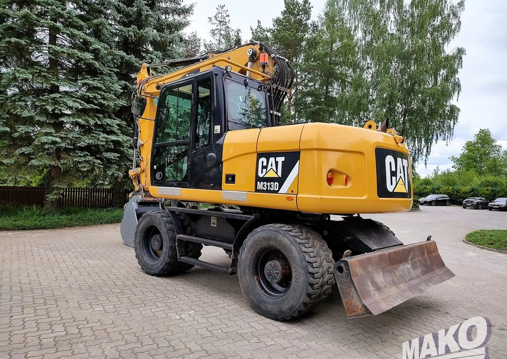 Caterpillar M313D - حفارة على عجلات: صور 2 Caterpillar M313D - حفارة على عجلات: صور 2