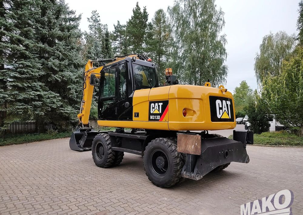 Caterpillar M313D - حفارة على عجلات: صور 2 Caterpillar M313D - حفارة على عجلات: صور 2