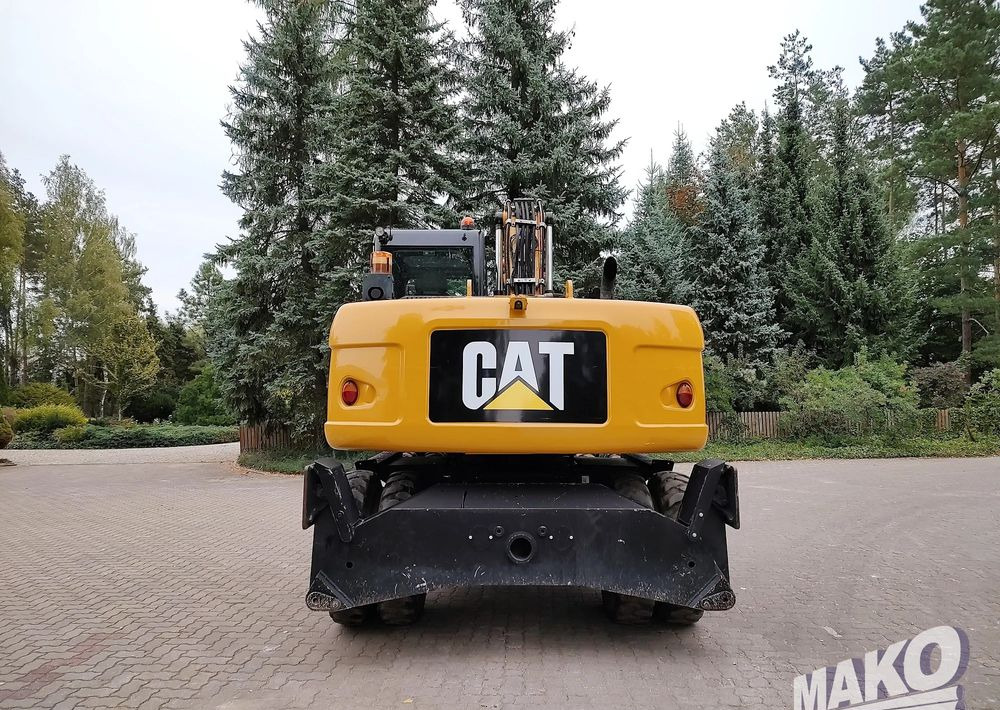Caterpillar M313D - حفارة على عجلات: صور 3 Caterpillar M313D - حفارة على عجلات: صور 3