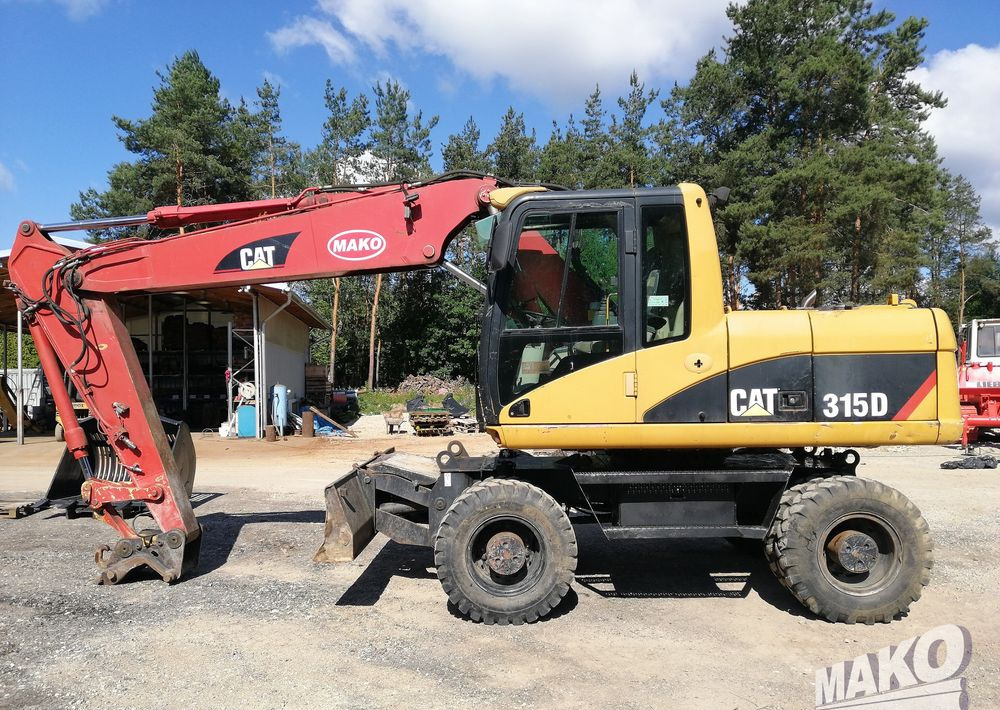 Caterpillar M315 C - حفارة على عجلات: صور 2 Caterpillar M315 C - حفارة على عجلات: صور 2