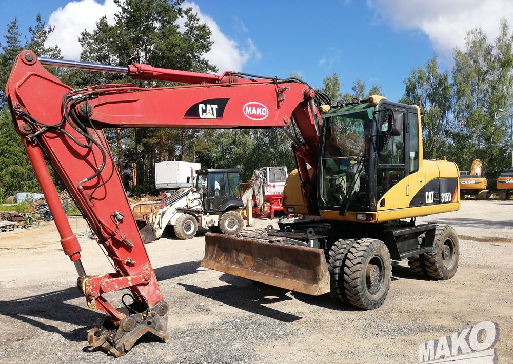 Caterpillar M315 C - حفارة على عجلات: صور 1 Caterpillar M315 C - حفارة على عجلات: صور 1