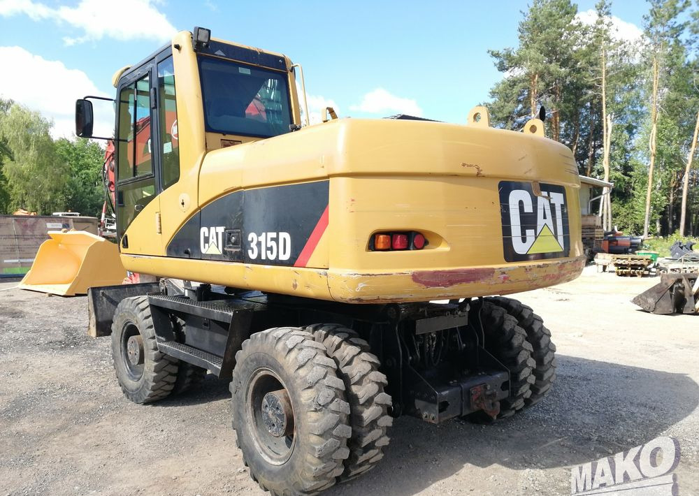 Caterpillar M315 C - حفارة على عجلات: صور 3 Caterpillar M315 C - حفارة على عجلات: صور 3