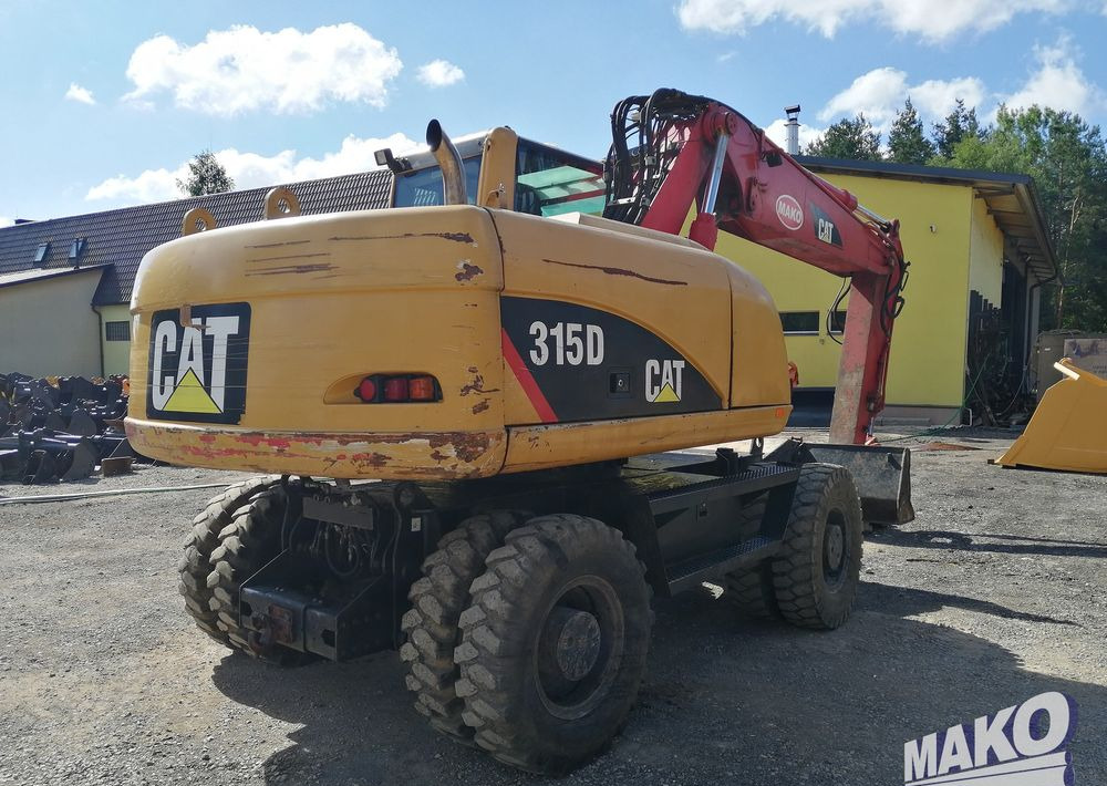 Caterpillar M315 C - حفارة على عجلات: صور 5 Caterpillar M315 C - حفارة على عجلات: صور 5