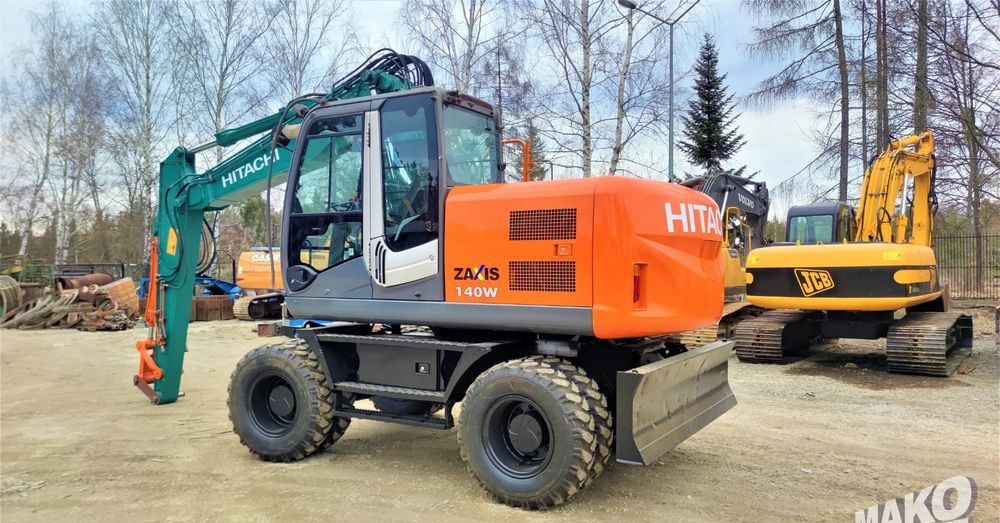 Hitachi ZX140W-3 - حفارة على عجلات: صور 2 Hitachi ZX140W-3 - حفارة على عجلات: صور 2