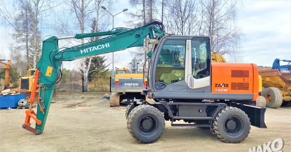 Hitachi ZX140W-3 - حفارة على عجلات: صور 1 Hitachi ZX140W-3 - حفارة على عجلات: صور 1