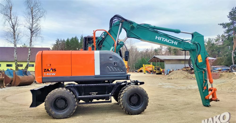 Hitachi ZX140W-3 - حفارة على عجلات: صور 5 Hitachi ZX140W-3 - حفارة على عجلات: صور 5