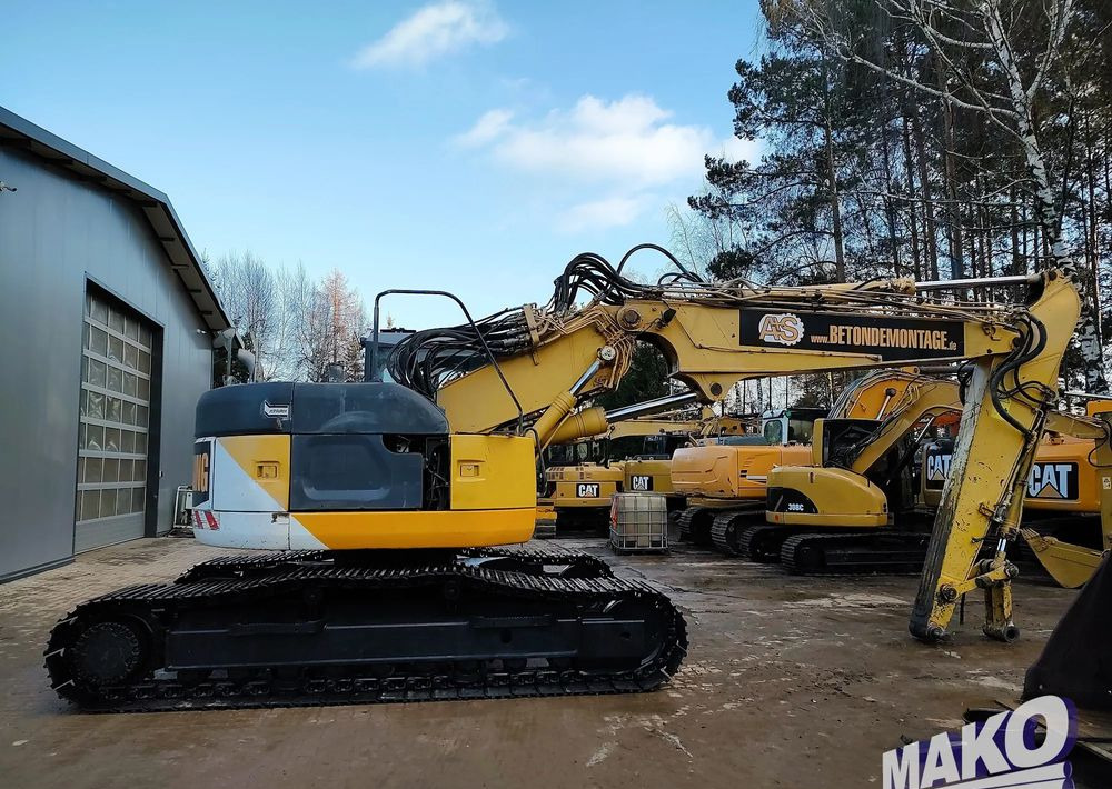 Komatsu PC228USLC-3 - حفارات زحافة: صور 5 Komatsu PC228USLC-3 - حفارات زحافة: صور 5
